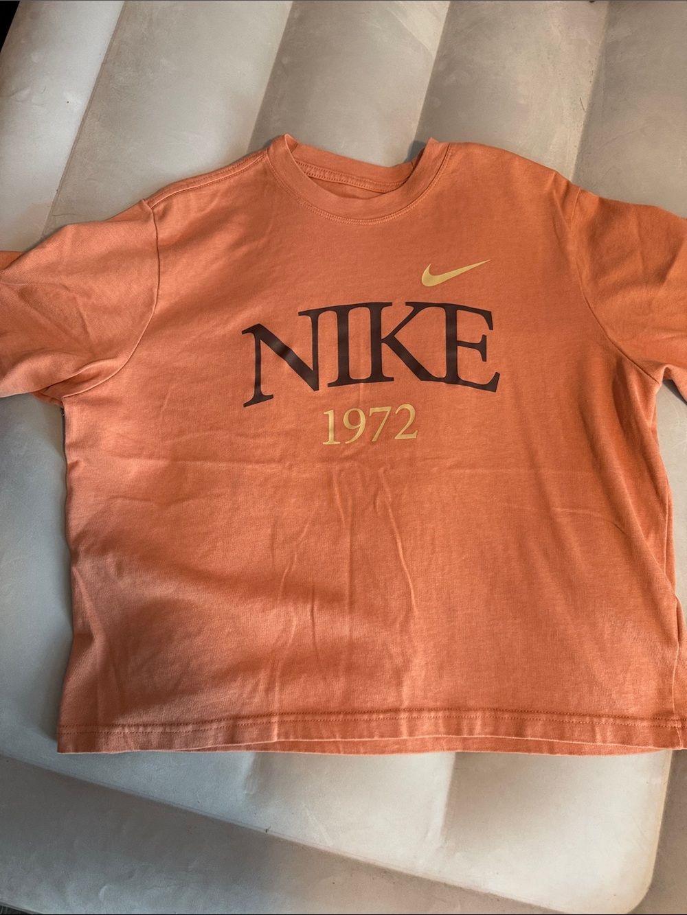 Women’s Cropped Nike Orange Short-Sleeve Logo Tee with Yellow Accents